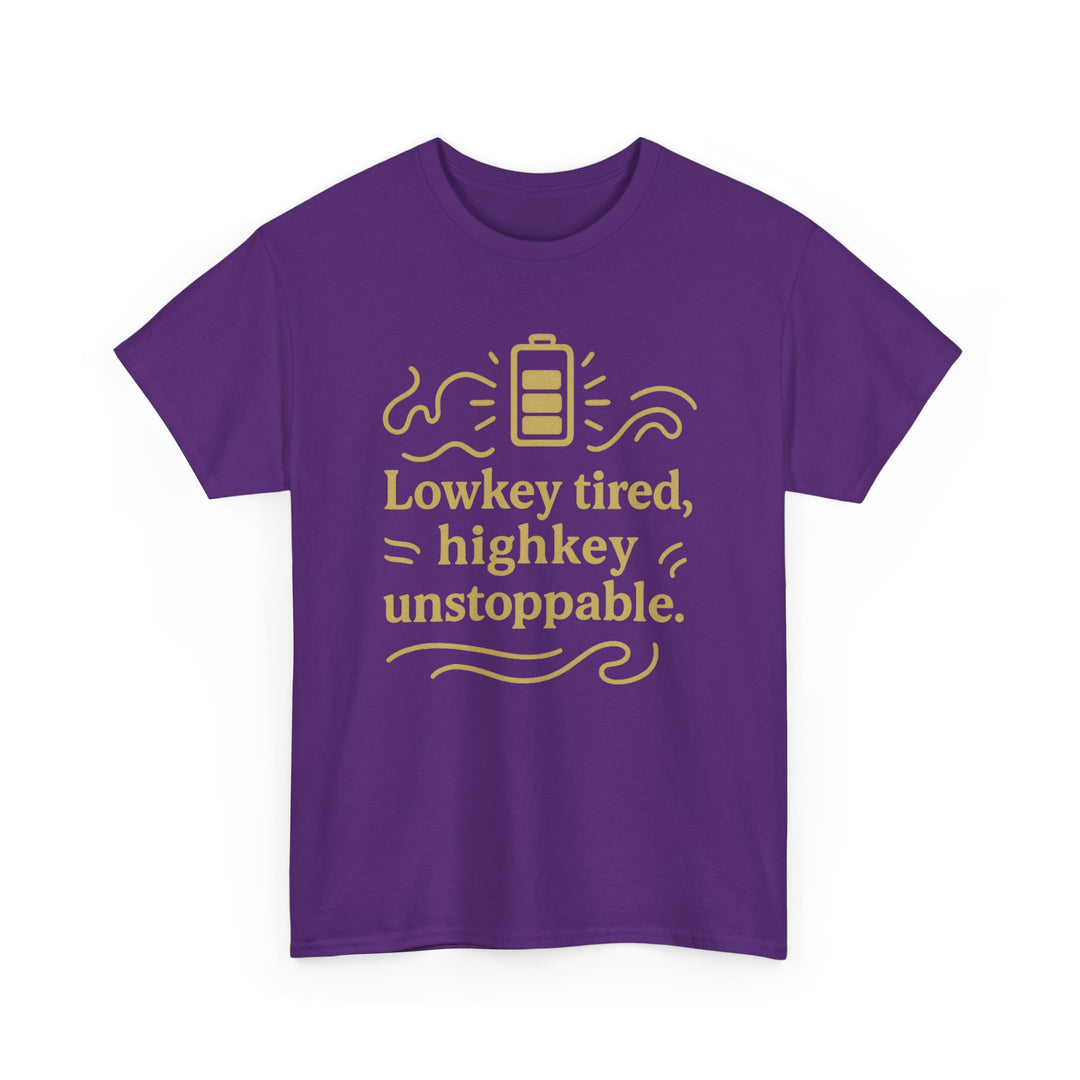 Lowkey Tired, High Key Unstoppable. Unisex Heavy Cotton Tee