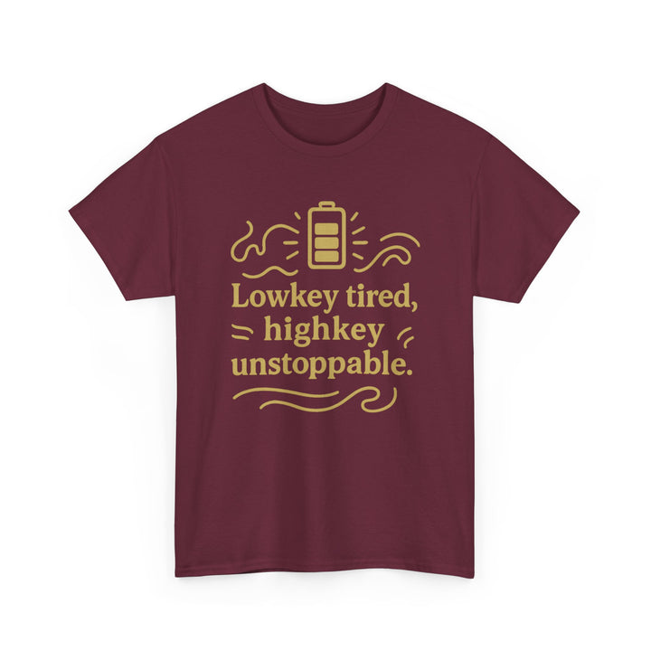 Lowkey Tired, High Key Unstoppable. Unisex Heavy Cotton Tee