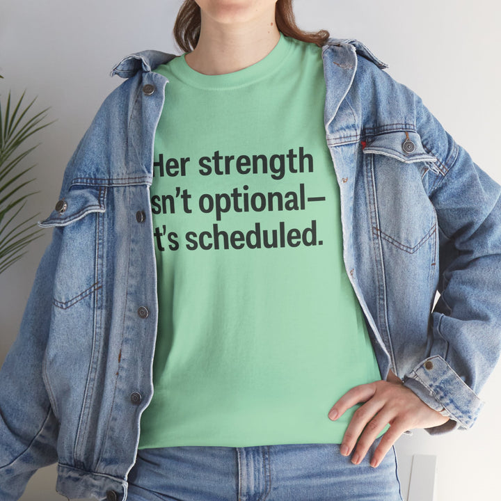 Her Strength isn't optional- it's scheduled. Unisex Heavy Cotton Tee