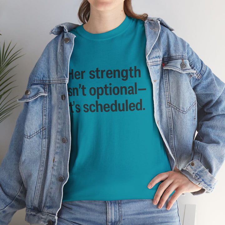 Her Strength isn't optional- it's scheduled. Unisex Heavy Cotton Tee