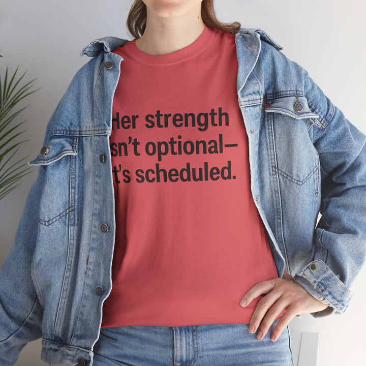 Her Strength isn't optional- it's scheduled. Unisex Heavy Cotton Tee