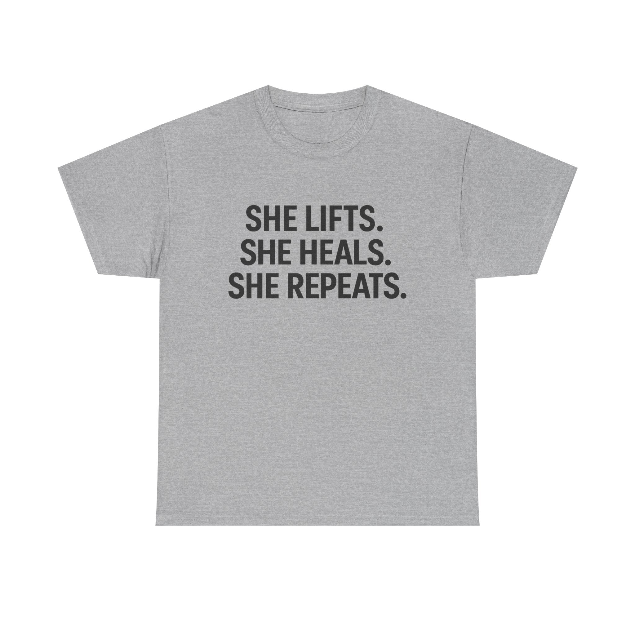 She Lifts. She Heals. She Repeats.  Unisex Heavy Cotton Tee