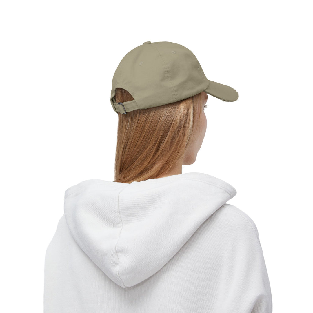 She Lifts. She Heals. She Repeats. : Unisex Distressed Cap