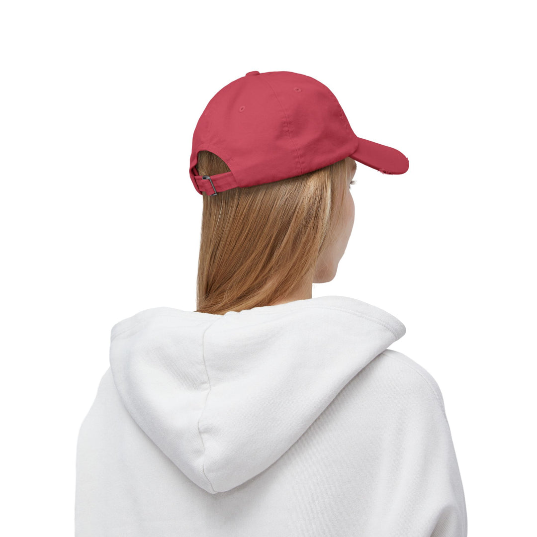 She Lifts. She Heals. She Repeats. : Unisex Distressed Cap