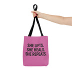 She Lifts. She Heals. She Repeats. Tote Bag