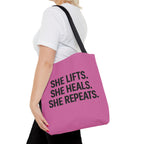 She Lifts. She Heals. She Repeats. Tote Bag