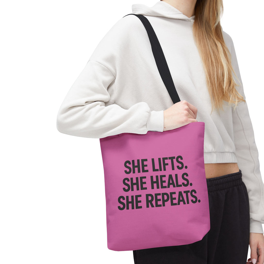 She Lifts. She Heals. She Repeats. Tote Bag