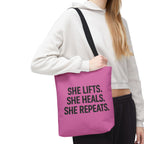 She Lifts. She Heals. She Repeats. Tote Bag