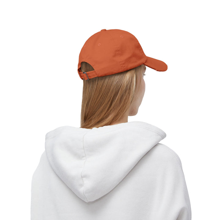 She Lifts. She Heals. She Repeats. : Unisex Distressed Cap