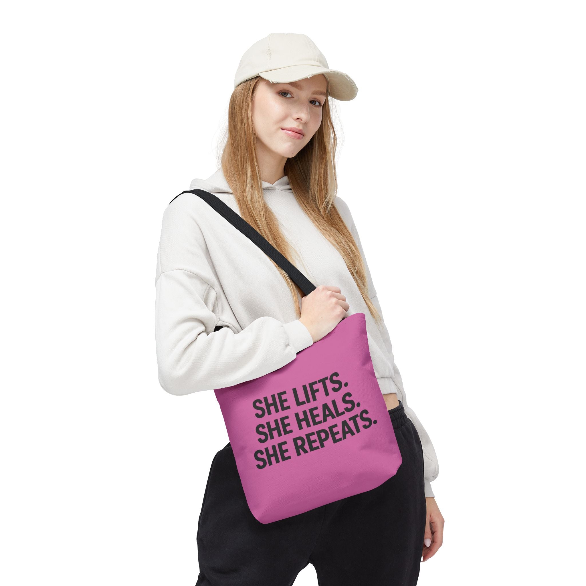 She Lifts. She Heals. She Repeats. Tote Bag