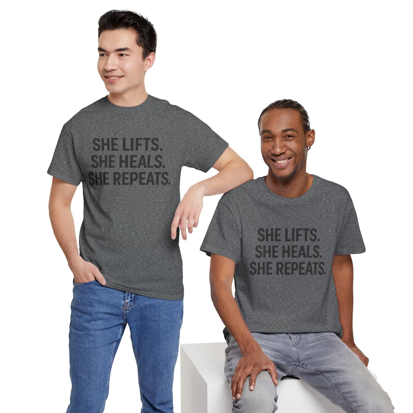 She Lifts. She Heals. She Repeats.  Unisex Heavy Cotton Tee