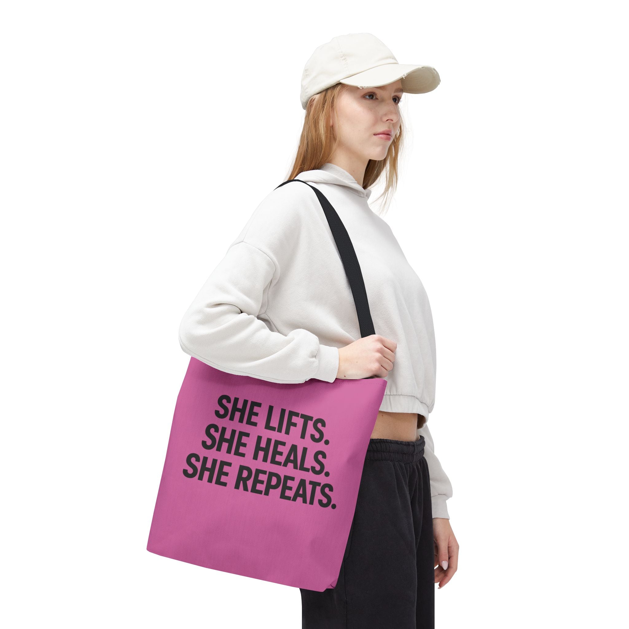 She Lifts. She Heals. She Repeats. Tote Bag