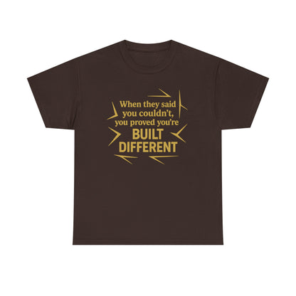 When They Said You Couldn't, You Proved Your'e Built Different. Unisex Heavy Cotton Tee