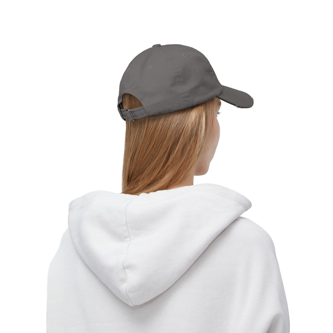 She Lifts. She Heals. She Repeats. : Unisex Distressed Cap