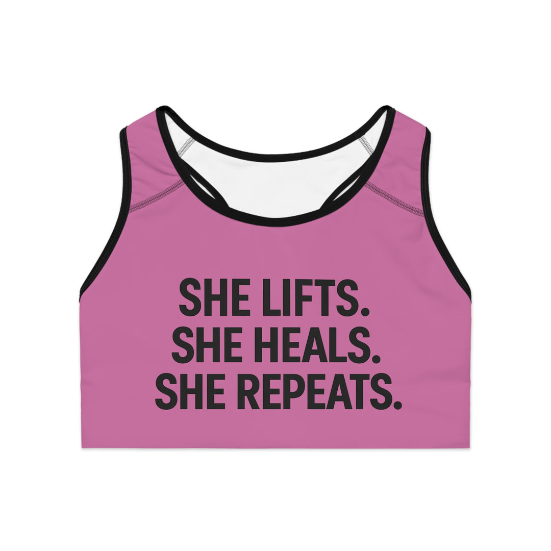 She Lifts. She Heals. She Repeats. Sports Bra