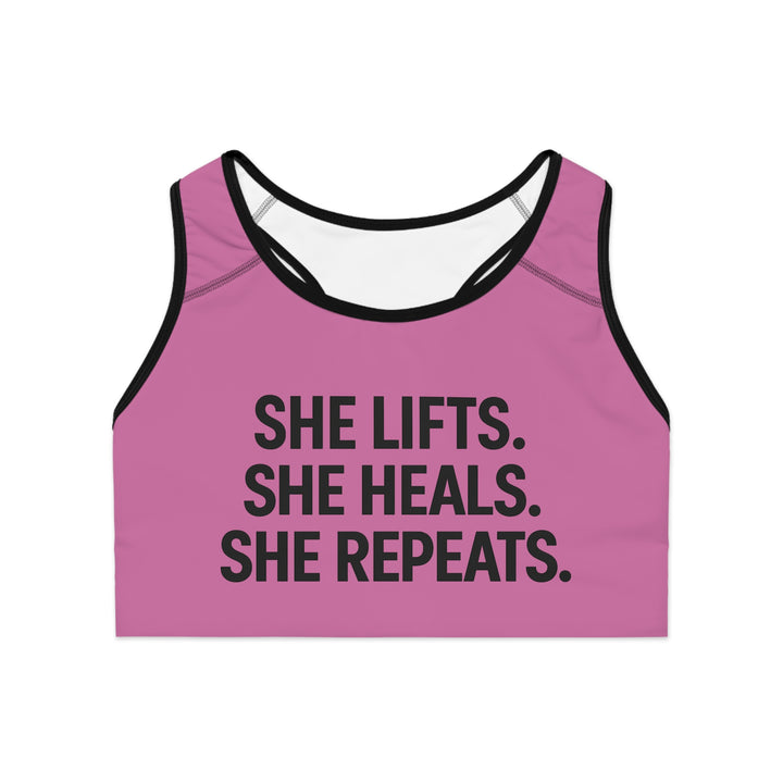 She Lifts. She Heals. She Repeats. Sports Bra