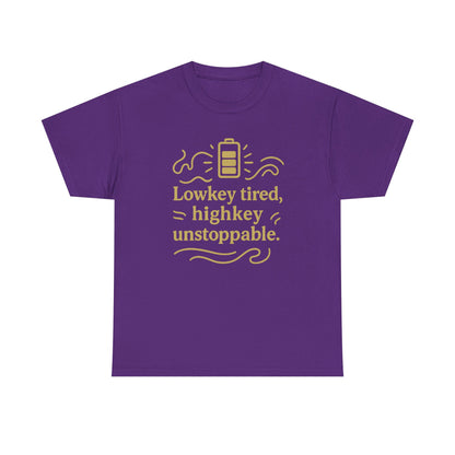 Lowkey Tired, High Key Unstoppable. Unisex Heavy Cotton Tee
